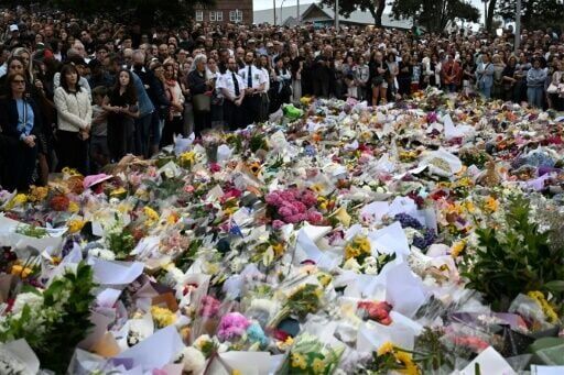Mourners gather at a tribute in memory of the victims of a shooting at Bondi Beach.