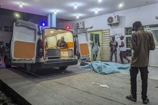 An injured man looks out of an ambulance at a hospital in Maiduguri following blasts across the northeastern Nigerian city