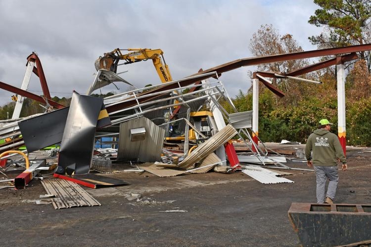 Vacant gas station demolished on Cherokee and Airport