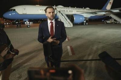US Vice President JD Vance speaks to the media before boarding Air Force Two in Budapest