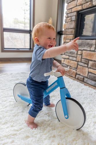 From tummy time to toddling, the Strider Baby Balance Bike is the one toy that supports every stage of a baby's development from 0-18 months. With bumpy letters, numbers, and shapes on the wheels, the bike begins as an adorable tummy time toy that deliv...