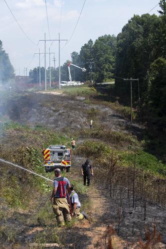 PHOTOS: Brush fire between Riverchase Drive and Sturdivant Road