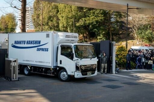 A truck believed to be carrying the twin pandas departs from Ueno Zoo in Tokyo on January 27, 2026, heading off on their return to China