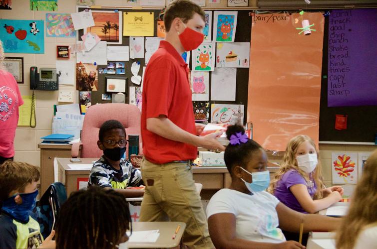 Third graders at TES get dictionaries thanks to Tallassee Rotary Club