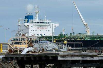 A tanker unloads oil in Wellington, New Zealand, on March 27, 2026