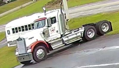 Law enforcement searches for stolen truck and load of lumber