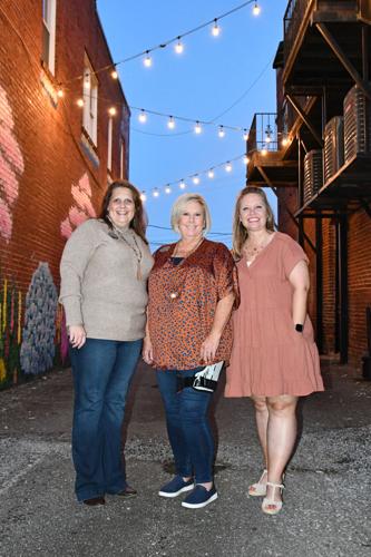 PHOTOS: Models strut down Main Street at 'Sip, Shop and Support'