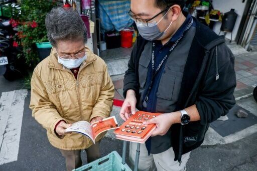 Taiwan is handing out paper copies of a crisis manual to help resident prepare for natural disasters -- or invasion
