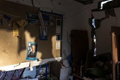 A portrait of Israeli Prime Minister Benjamin Netanyahu on the wall of a kindergarten damaged in an Iranian missile strike in Dimona on March 22