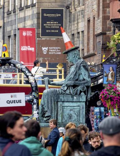 Pictures show cones on famous Edinburgh statues as council warns against the prank