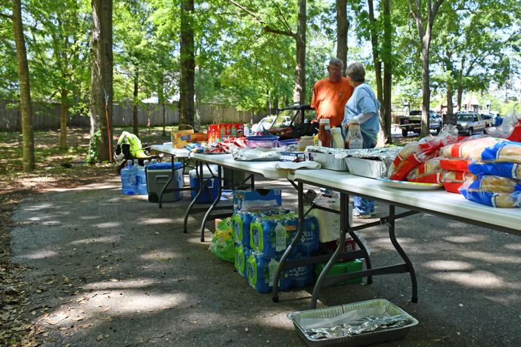 PHOTOS: Hellas Fibers and Beautification Board volunteers spruce up Keebler Park