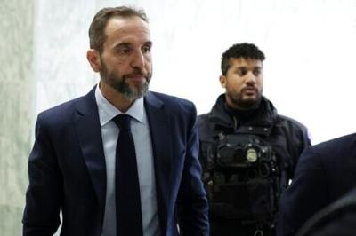 Former Special Counsel Jack Smith (L) arrives to testify behind closed doors to the House Judiciary Committee