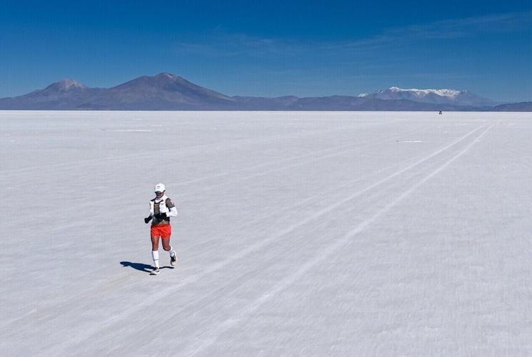 Fernanda Maciel running across the Salar de Uyuni during her record crossing attempt, in Uyuni, Bolivia, on September 28, 2026.