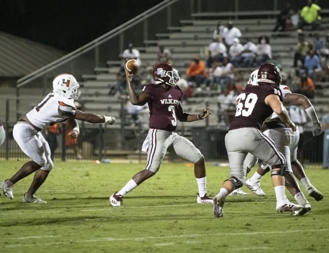 PHOTOS: Ben Russell hosts Huffman in the first game of the season