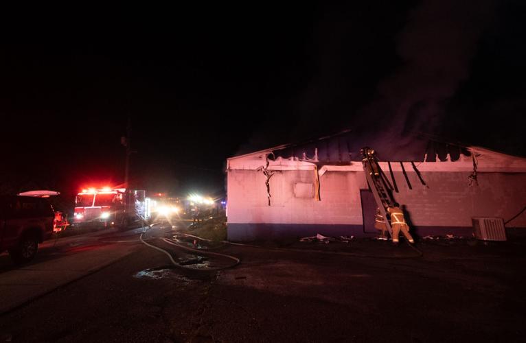 Photos: Firefighters battle blaze at McGhee Furniture Warehouse