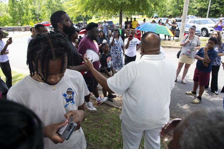 PHOTOS: Residents gather for murder victim and justice