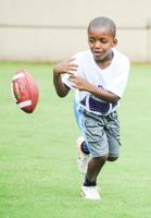 PHOTOS: Auburn players visit Bridge Builders youth football camp in Alex City