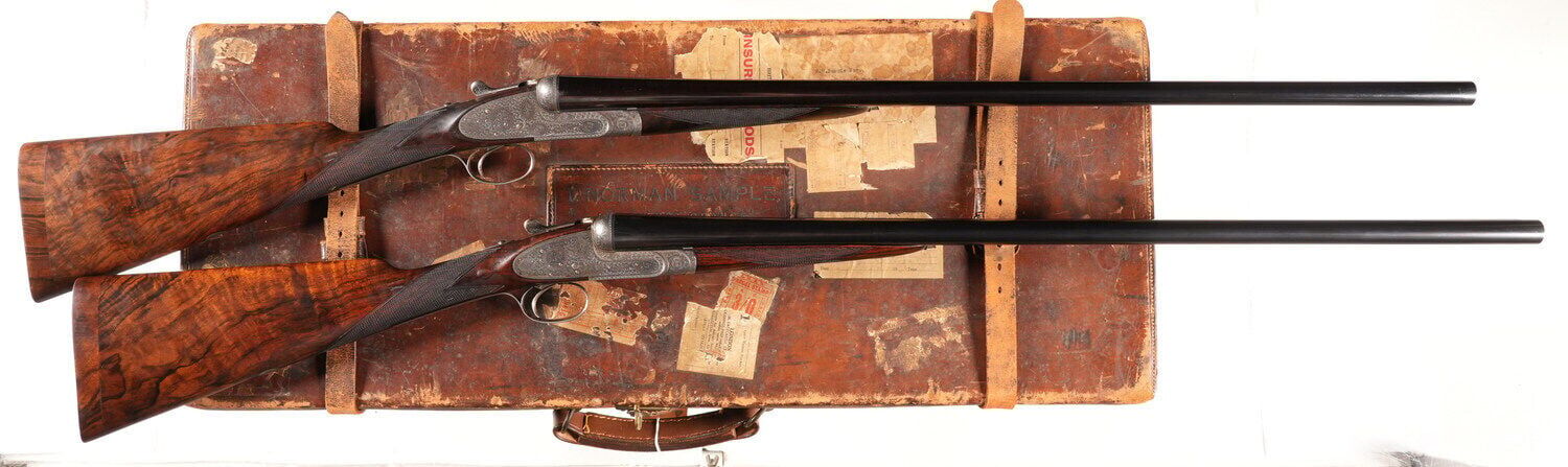 Pair of Boss & Co sidelock ejector SXS 12-gauge double bore shotguns, mechanically excellent and offered together as one lot, housed in an oak and leather trunk case. Estimate: $14,000-$18,000