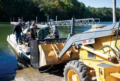 Volunteers have fun with cleanup