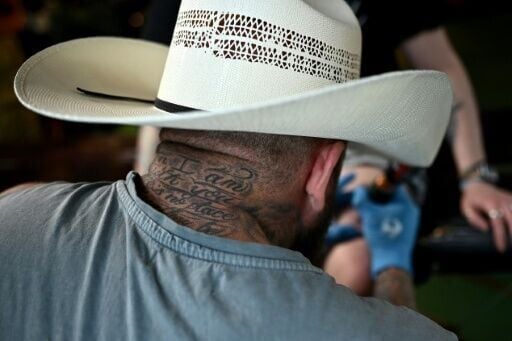 Tattoo artists such as Kyle Walker are kept busy at the event