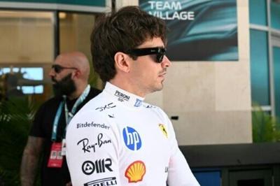 Ferrari's Monegasque driver Charles Leclerc leaves the paddock and makes his way toward the garage before the start of practice for the 2026 Miami Formula One Grand Prix