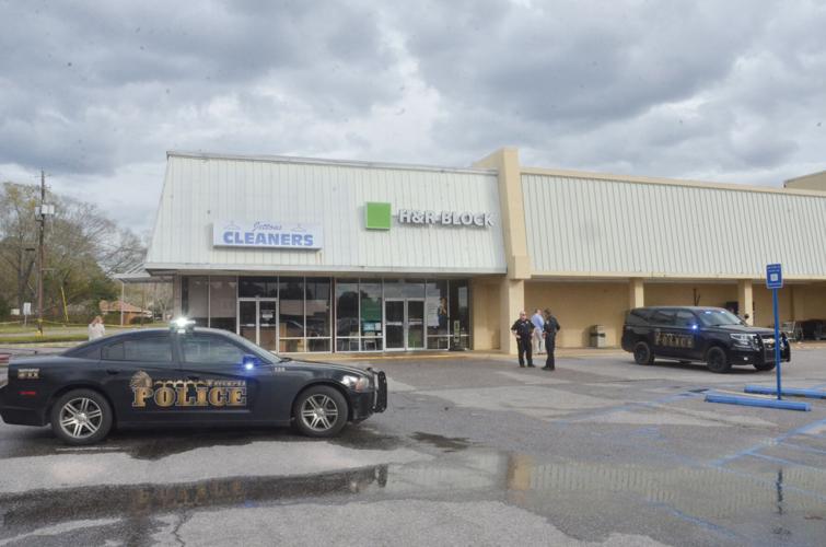 PHOTOS: No major injuries as car drives through building