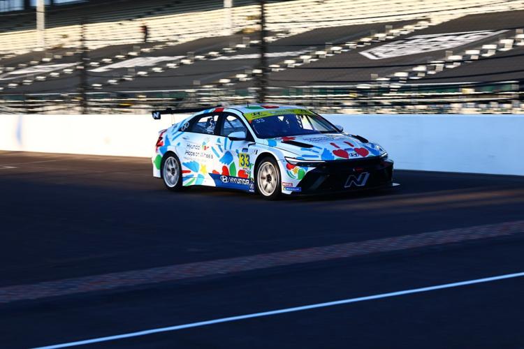 The No. 33 Hyundai Elantra N TCR driven by Bryson Morris and Mark Wilkins, is photographed wearing its Hyundai Hope on Wheels livery during the Indianapolis Motor Speedway 120 at the Indianapolis Motor Speedway in Indianapolis, Ind., Sept. 20, 2025. (Ph...