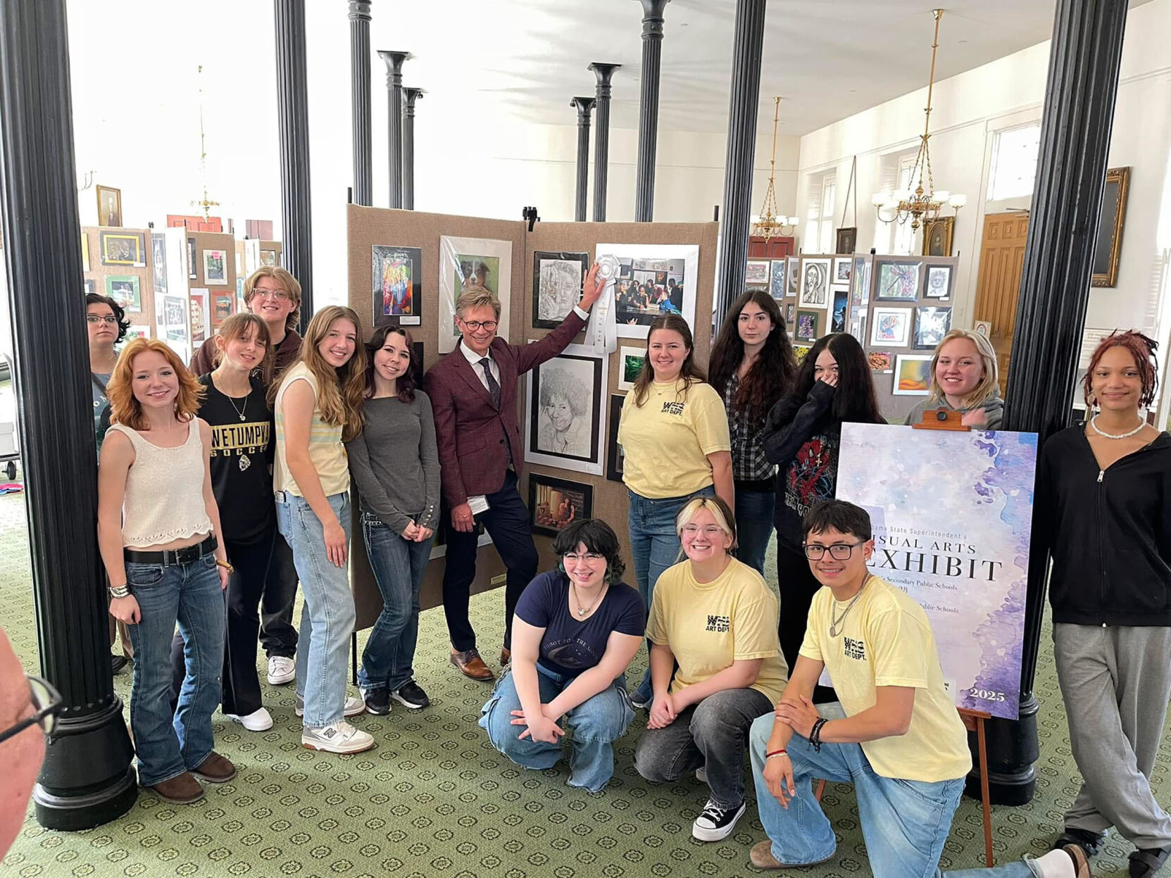 Wetumpka High students hang art in capitol