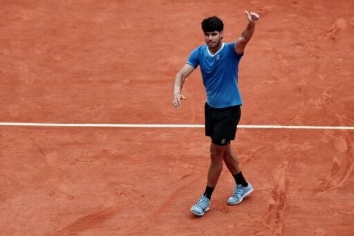 Carlos Alcaraz celebrates his victory over Alexander Bublik