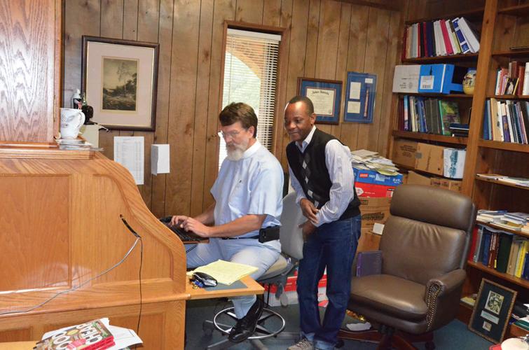 Eclectic man helps plan Congolese town from afar