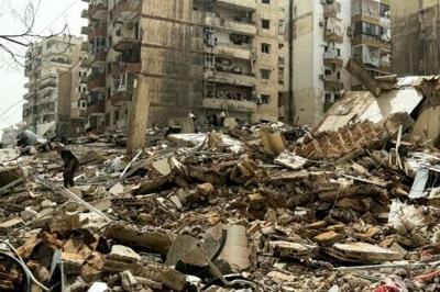 Displaced residents inspect the damage as they return to their homes in Beirut’s southern suburbs