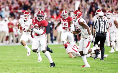 Alabama rolls to homecoming win over Arkansas