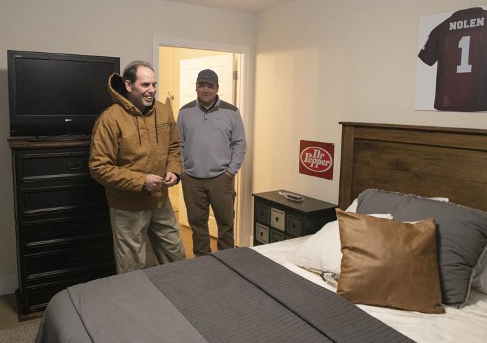 PHOTOS: Johnny Nolen gets his new house just days before Christmas