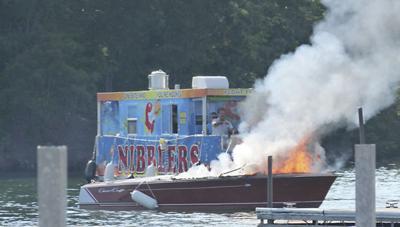 Wooden boat catches fire near Ridge Marina, citizens lend hand