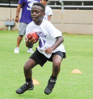 PHOTOS: Auburn players visit Bridge Builders youth football camp in Alex City