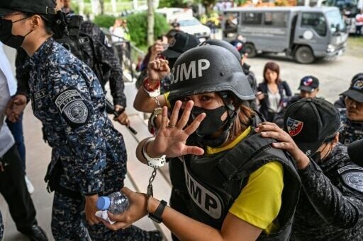 Filipino journalist Frenchie Mae Cumpio arrives at Tacloban Regional Trial Court in Leyte island on January 22, 2026