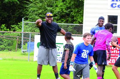 Bell helps coaches, players on both sides of local rivalry