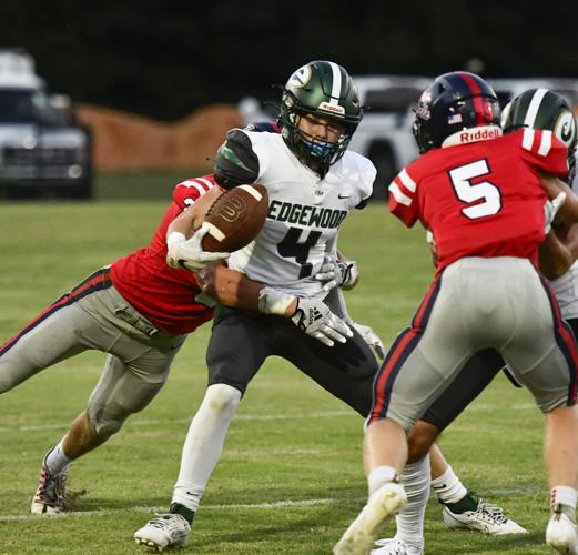 PHOTOS: Edgewood Academy football drops season opener