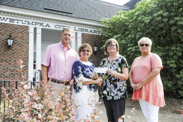 PHOTOS: Donation to library