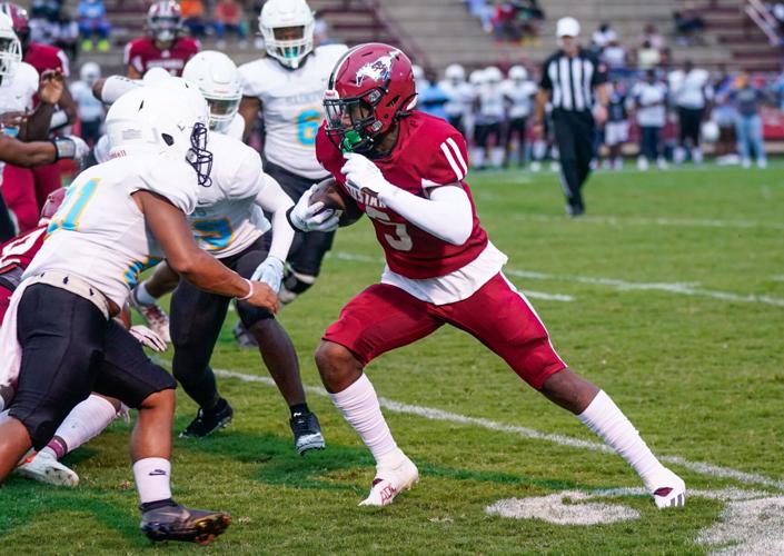 PHOTOS: Rain doesn't stop Stanhope Elmore's 37-0 shutout of Selma