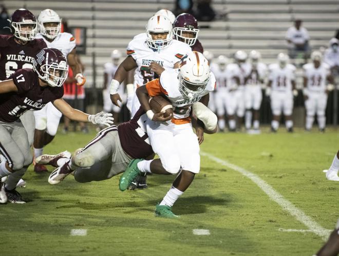 PHOTOS: Ben Russell hosts Huffman in the first game of the season