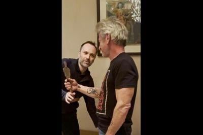 The company posted a video of its CEO gifting Penn a silver statue in the shape of an Oscar