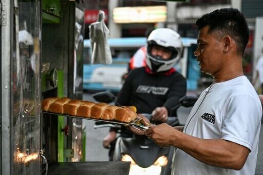Rising liquefied petroleum gas prices are squeezing the already thin margins of Filipino street food vendors