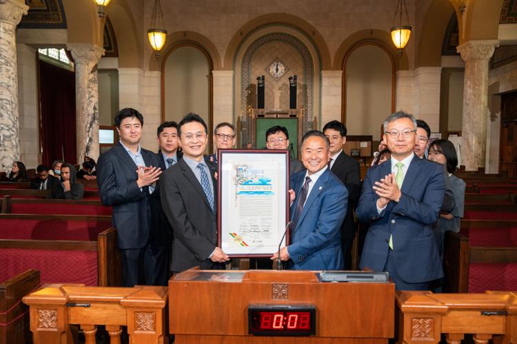 "2026 K-EXPO USA" Official Launch Proclamation Ceremony in Los Angeles (1) (KOCCA Acting President Yoo Hyun-seok (front row, second from left) and LA City Councilmember John Lee (front row, center right) pose for a commemorative photo with key Korean an...