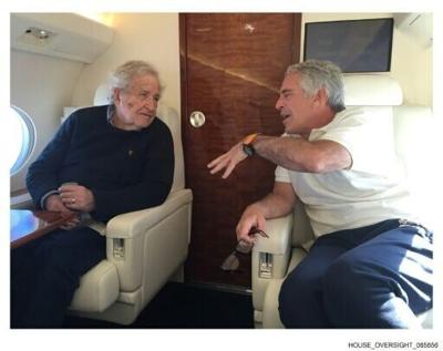 This undated and unlocated handout image released by Democrats on the House Oversight Committee on December 18, 2025 shows late convicted sex offender Jeffrey Epstein (R) speaking to US professor and political activist Noam Chomsky