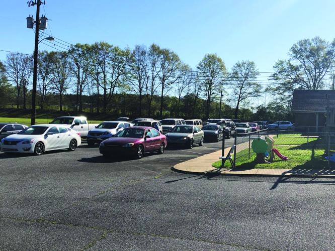 Eclectic churches feed 150 families with mobile pantry