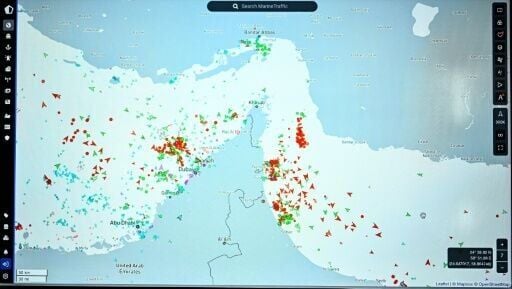 This photograph of a page on the Marinetraffic website shows commercial boat traffic on the edge of the Strait of Hormuz near the Iranian coast, in early March
