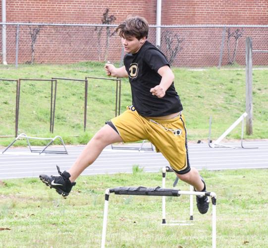 PHOTOS: Dadeville still working despite not having coach