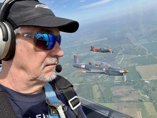 Founder Dean Siracusa flying formation in a TB30 Epsilon, with a second Epsilon and an SF260 off the wing, wearing the new Kingfisher Sport under a Lightspeed Zulu 3. The 1mm Resilamideâ„¢ temples disappear under the ear seals, so there is nothing to thin...