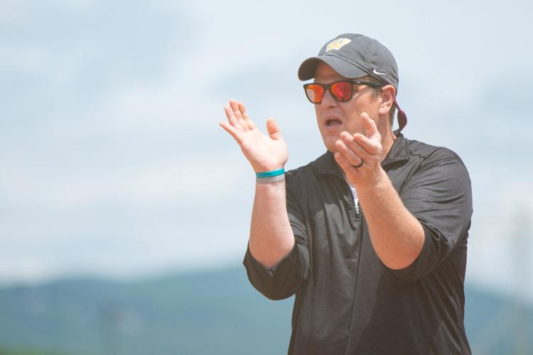 PHOTOS: Area teams play in regional softball tourney